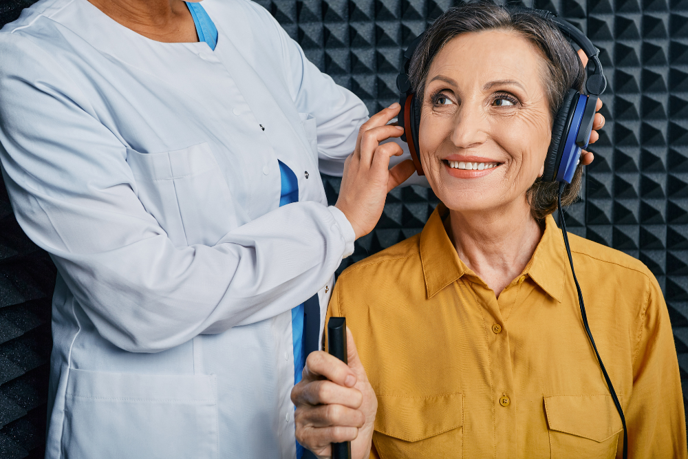 audiologist using hearing testing to increase patient revenue